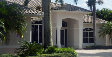 Front of Tan Home with Homeowners Insurance in Carrollwood, Greater Northdale, Lutz, Tampa, Temple Terrace, Westchase