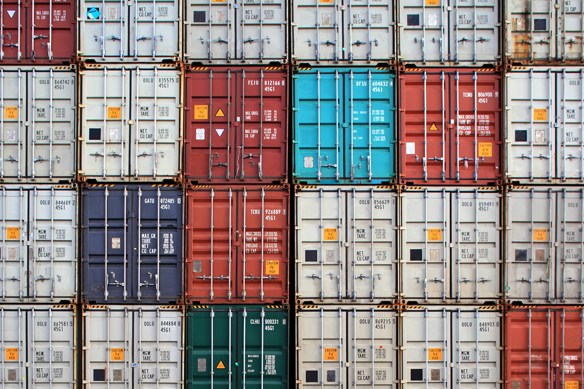 Shipping containers stacked together, protected by inland marine property insurance in Tampa, FL